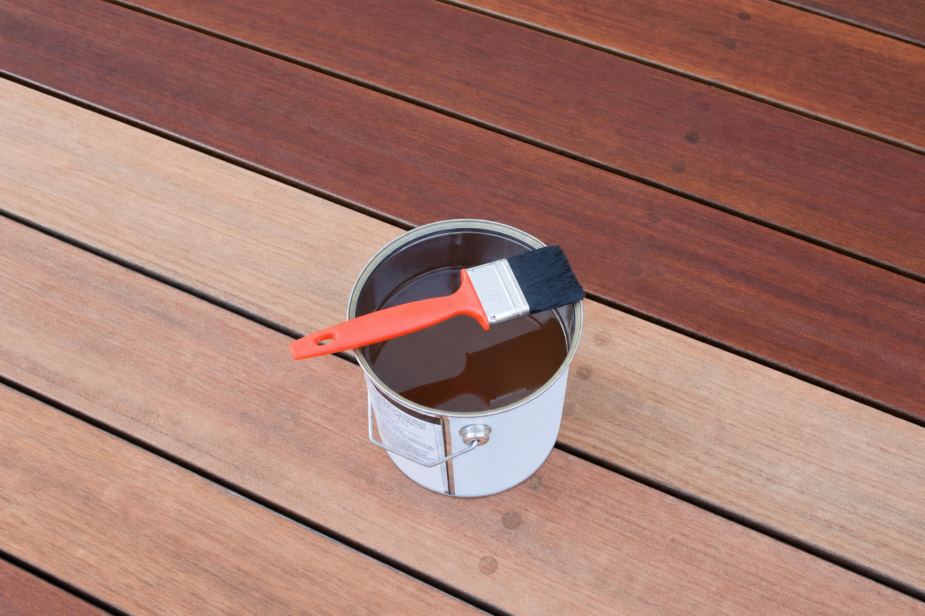 Fence staining and sealing